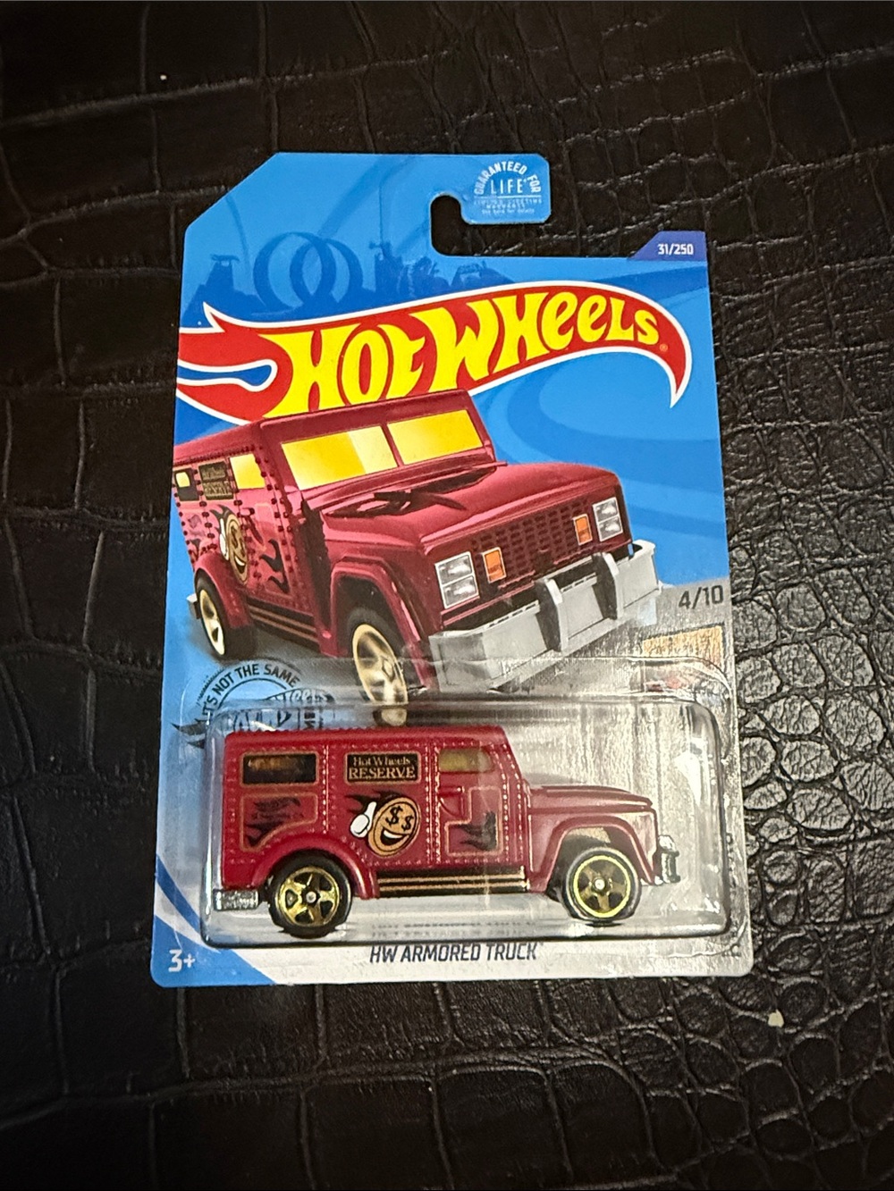 Mattel Hot Wheels HW Armored Truck - Maroon & Gold Wheels
